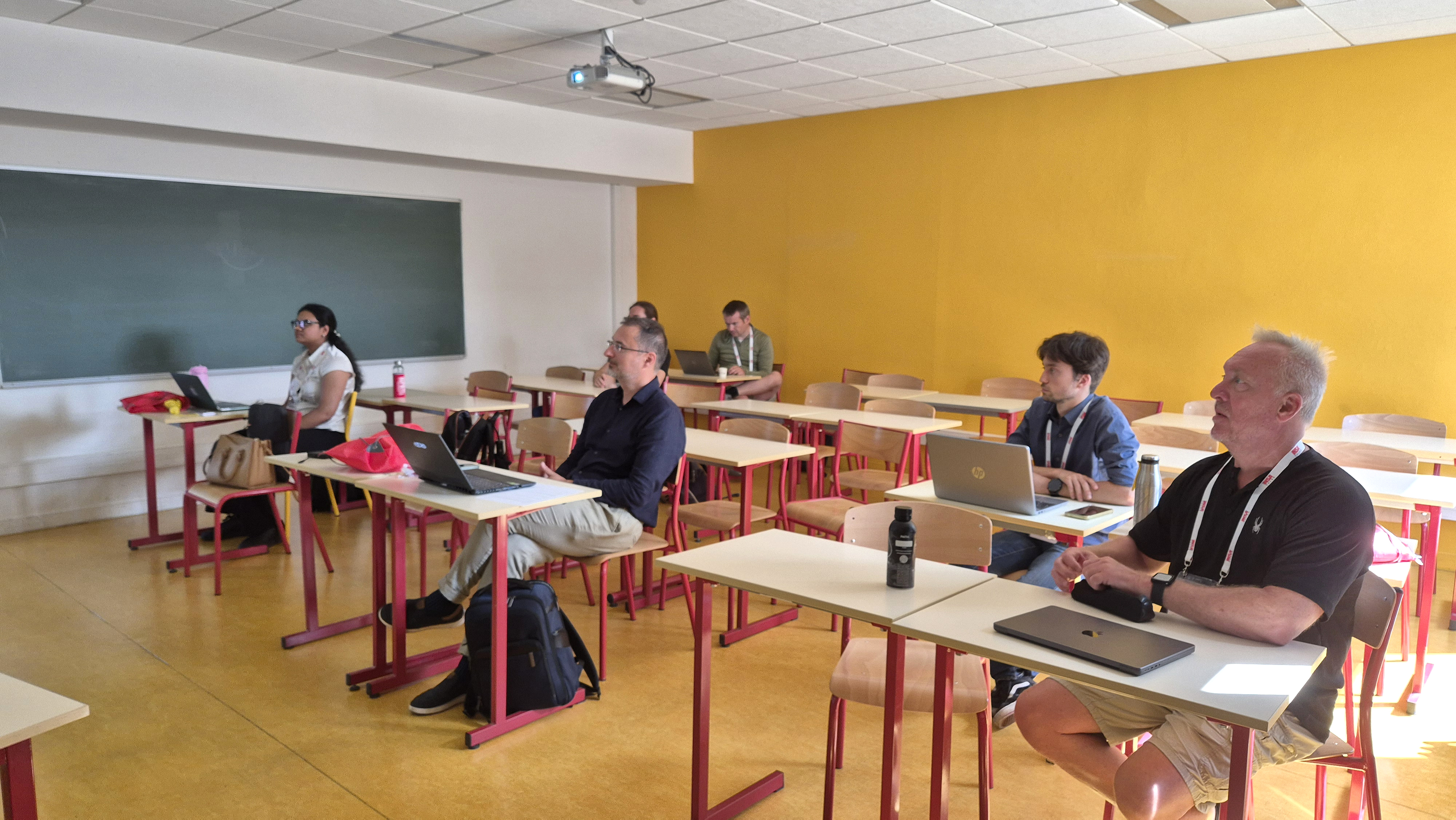 The workshop co-organizer Emanuel Aldea and some attendees